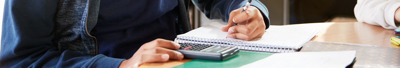 High school student learning how to budget