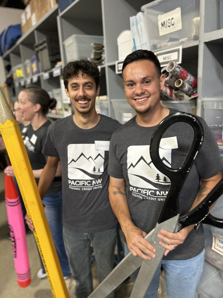 Employees packing school supplies