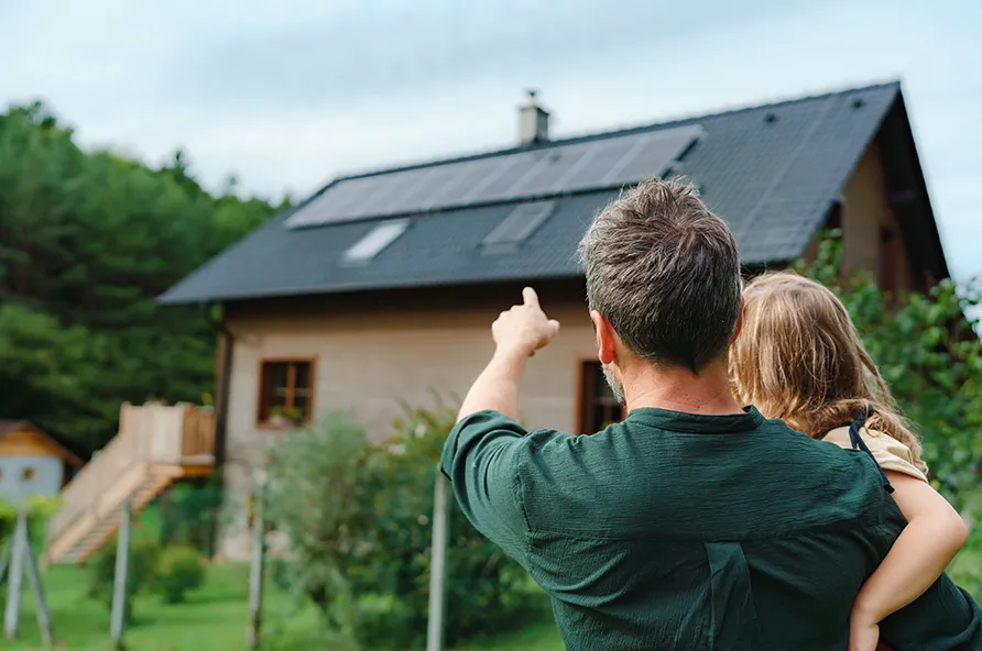 Family looking at energy efficient home
