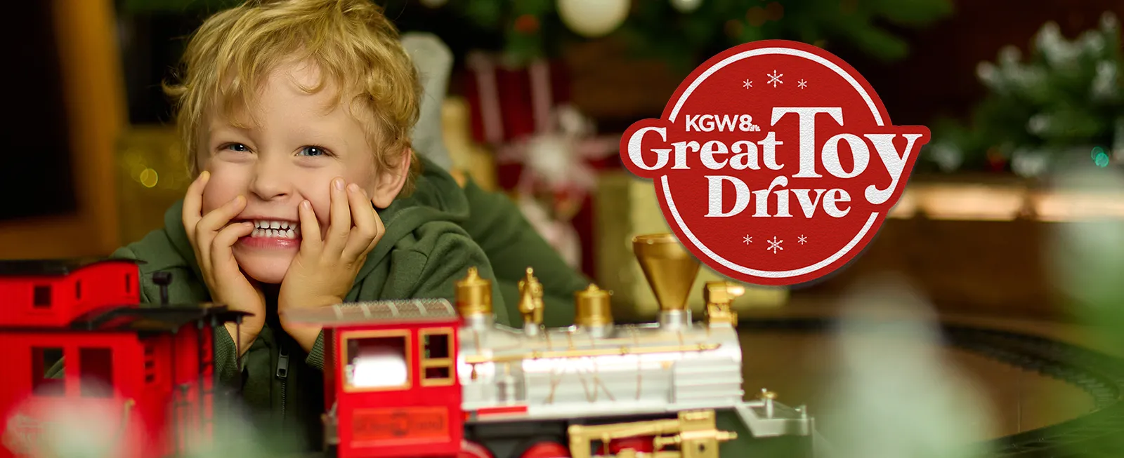 Child with a toy train